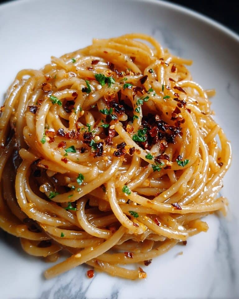 Caramelized Onion Pasta with Chili Oil: A Sweet and Spicy Flavor Bomb Recipe