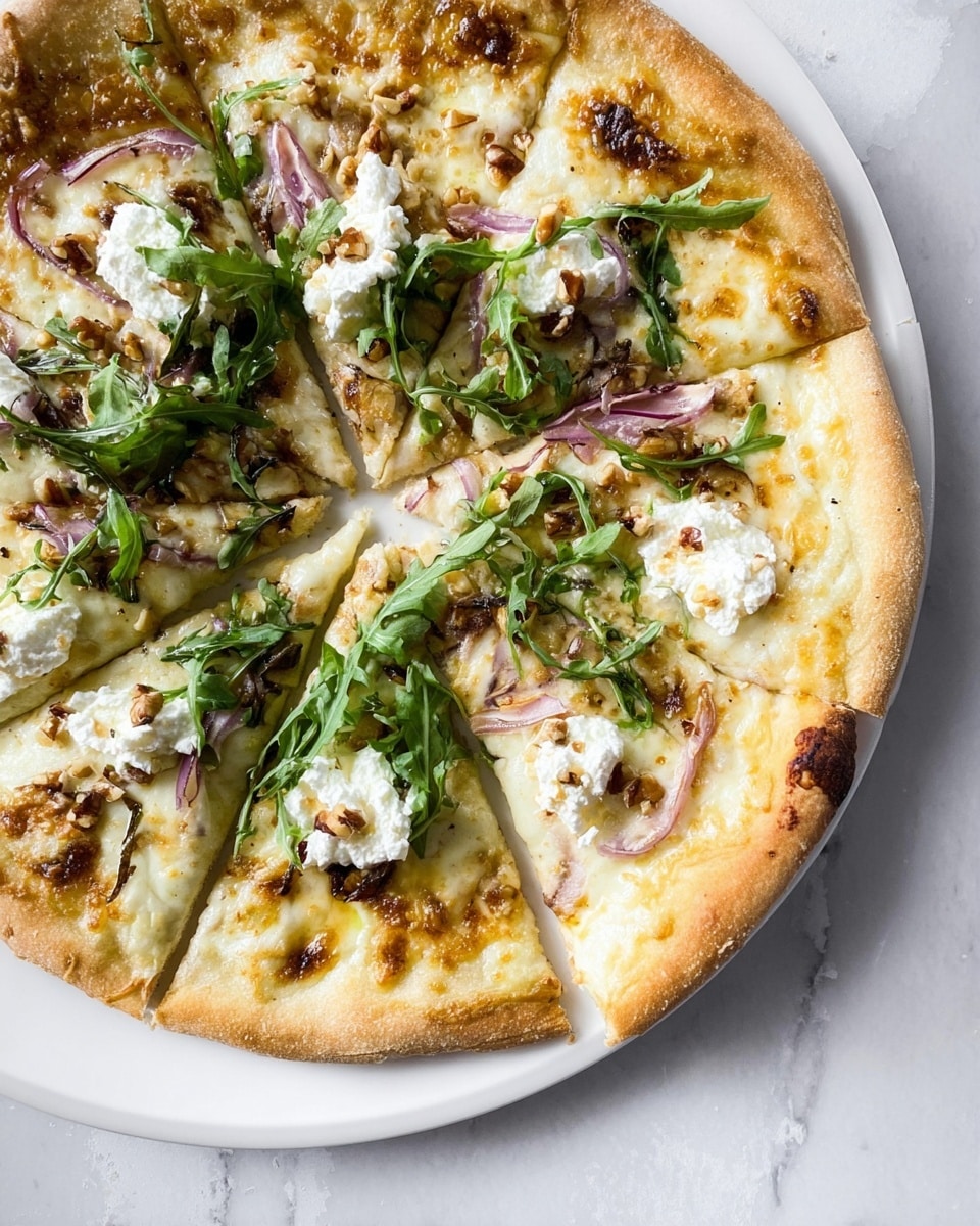 A white pizza with a thick, light golden crust on a white plate, resting on a white marbled texture. The pizza is cut into eight slices, topped with melted mozzarella cheese that is creamy white with some golden brown spots, dollops of white ricotta cheese, thin slices of caramelized red onions with a translucent purple hue, and scattered green arugula leaves. There are also small chunks of brown nuts sprinkled on top, adding texture. The toppings are evenly spread over the melted cheese layer on the dough, creating a fresh and rich look. photo taken with an iphone --ar 4:5 --v 7